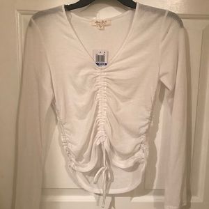 white long sleeve top